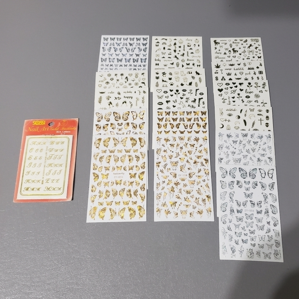 gold and silver tone 17 sheets of nail art stickers,